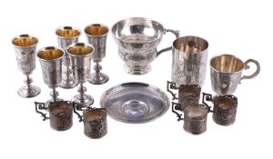 A group of Russian silver, comprising a set of five small wine goblets, possibly by Pyetr