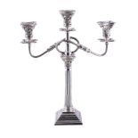 A silver three light candelabrum by Alexander Smith, Birmingham 1959, with beaded sconces, the