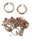 A collection of gold coloured jewellery , to include a 9 carat gold ingot; a 9 carat gold ring;