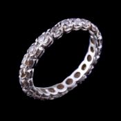 A diamond eternity ring, set throughout with old brilliant cut diamonds, approximately 0.80 carats