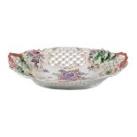 A Worcester pierced oval two-handled basket, circa 1770, painted with flowers, applied with twig