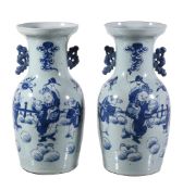 A pair of Chinese celadon glazed twin handled vases, late 19th / early 20th century, the baluster
