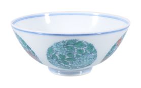 A Chinese Doucai 'medallion' bowl, with gently rounded sides, the exterior delicately painted with