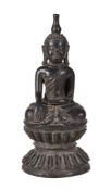 A Thai bronze Buddha , 20th century, seated on a double lotus throne, approximately 39cm high