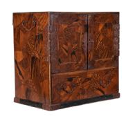 A Japanese parquetry Kodansu chest, Meiji-Tiasho, with two doors opening to six drawers and larger