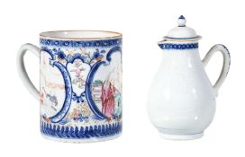 A Chinese Famille Rose mug, Qianlong, with three underglazed blue bordered panels painted with