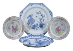 A pair of Chinese Famille Rose plates, Qianlong, painted with sprigs and sprays of flowers, 26cm