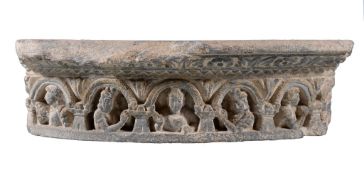 A Gandhara grey schist stupa base section, 3-4th century, the convex frieze with a series of arched