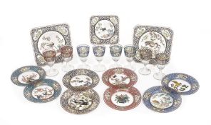 A Continental enamelled glass part table service, decorated in the Kakiemon manner, comprising: