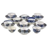 An assortment of mostly Worcester blue and white printed porcelain tea bowls and saucers, circa