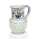 An English delft blue and white puzzle jug, probably Liverpool, mid 18th century, the cylindrical