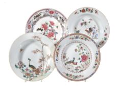 A Chinese Famille Rose 'Pheasant' plate, Qianlong, painted with the two birds perched on rocks