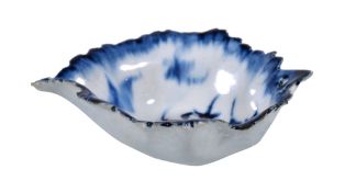 A Derby blue and white leaf-shaped pickle dish, circa 1770, painted with flowers, 9.5cm in length