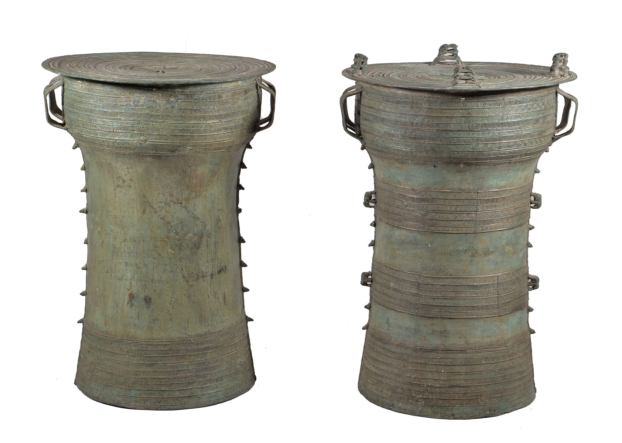 Two Burmese cast bronze 'rain drums', each of waisted cylindrical form with overlapping top and