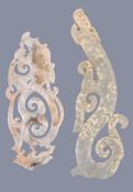 Two Chinese calcified jade archaic type carvings , each depicting stylised dragons, 16.7cm long and