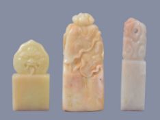 Three Chinese ' Baitian ' soapstone seals, the largest white stone with mutton fat inclusions and