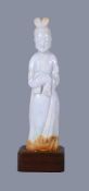 A Chinese Jadeite standing figure, wearing a long-sleeved robe with a sash, the hair is dressed in