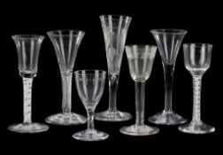 A group of seven mostly English drinking glasses, various dates mostly 18th century, comprising: