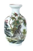 A small Chinese Famille Verte vase, painted with a seated dog before rocks and foliage, the reserve