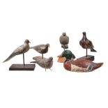 Six painted and carved wood bird decoys, late 19th and early 20th century, including models of a