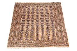 A Bokhara carpet, of gold colour, approximately , together with an Afghan rug, approximately 165 x