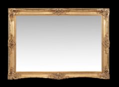 A gilt framed wall mirror, of recent manufacture, of very large proportion, 215cm high, 150cm wide