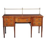 A George III mahogany sideboard, circa 1790, of serpentine outline, with an associated rail, 91cm