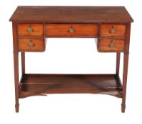 A Regency mahogany dressing table , circa 1815, the central frieze drawer flanked by double fronted
