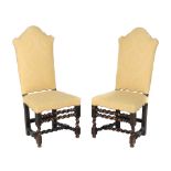 A pair of ebonised walnut highback side chairs , circa 1700, each with yellow upholstery