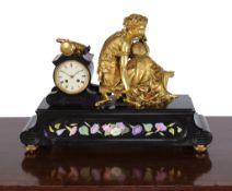 A French gilt bronze mounted black slate mantel clock , early 20th century, the eight-day bell