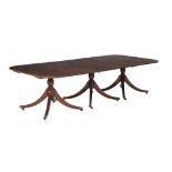 A mahogany triple pedestal dining table, in George III style, 20th century, 74cm high, the top 284