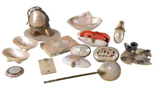 Ω A collection of mother-of-pearl objets vertu, 19th century, comprising a pocket watch stand