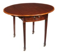 Ω A George III fiddleback mahogany and tulipwood crossbanded oval Pembroke table, circa 1790, the