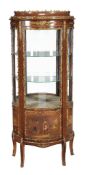 A French gilt metal mounted bowfront display cabinet, circa 1900, with Vernis Martin style