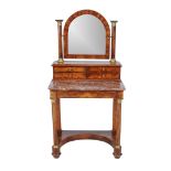 A Regency mahogany and gilt metal mounted dressing table, circa 1820, the arched mirror above an