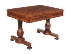 Ω An early Victorian rosewood library or centre table, circa 1840, with single blind frieze