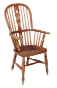 An ash and elm high back Windsor armchair, second quarter 19th century, bearing the original makers