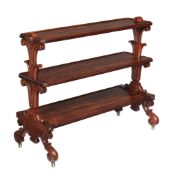 A William IV mahogany three tier whatnot, circa 1835, each shallow galleried tier divided by