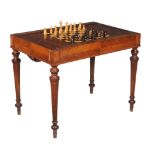 A Victorian hardwood tric-trac table, circa 1870, with removeable chequerboard top, one side with