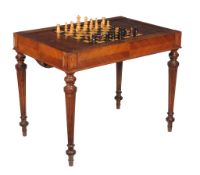 A Victorian hardwood tric-trac table, circa 1870, with removeable chequerboard top, one side with