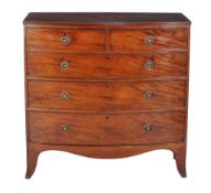 A mahogany bow front chest of drawers , early 19th century, 105cm high, 105cm wide, 52cm deep