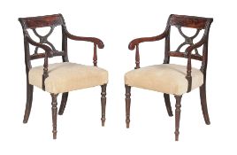 A pair of Regency mahogany armchairs , circa 1815, each with X-shaped splat