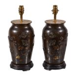 A pair of Japanese patinated bronze table lamps, Meiji period, late 19th century and later adapted