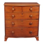 A mahogany chest of drawers, first half 19th century, of bowfront outline, 103cm high, 101cm wide,