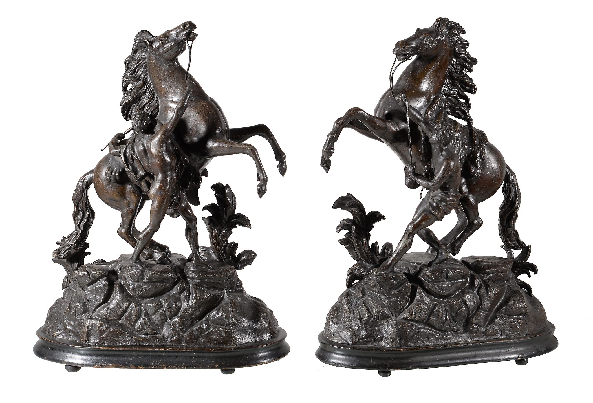 A pair of Continental spelter models of the Marly Horses, early 20th century, each cast with a
