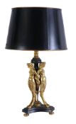 A gilt and patinated metal table lamp in Empire taste, early 20th century, with tole-peinte shade