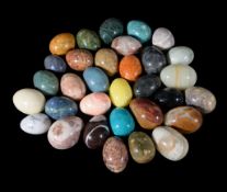 A quantity of assorted hardstone models of eggs, 20th century, including examples in onyx,