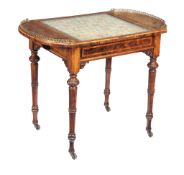 Ω A William IV figured walnut games table, circa 1835, the rectangular top with rounded and brass