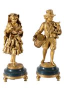 A pair of Continental gilt bronze models of itinerant entertainers, circa 1880, the young man