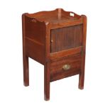 Two similar George III mahogany bedside commodes , late 18th century, each with a tambour front and